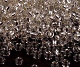 Ezüst közepű kristály cseh üveg kásagyöngy 9/0 - Preciosa - 10g Ezüst közepű kristály cseh üveg kásagyöngy 9/0 - Preciosa - 10g
